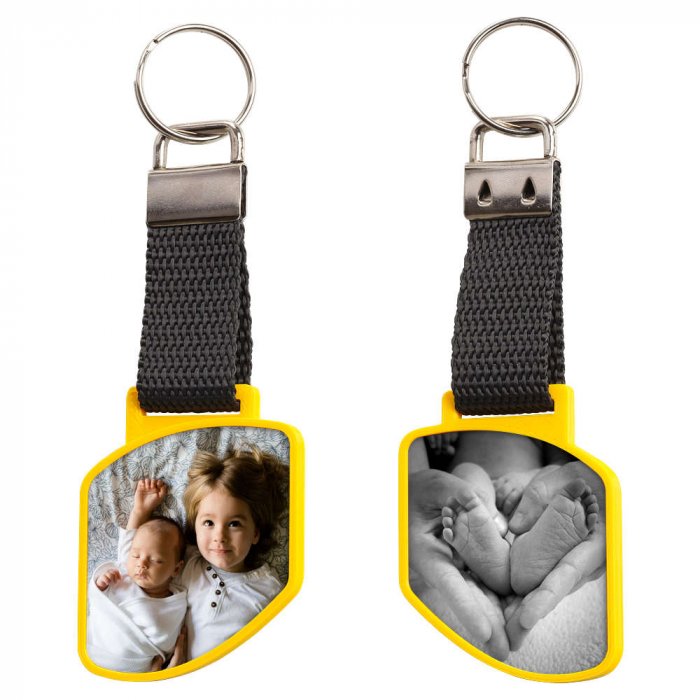 Schluesselanhaenger Swing mit Foto gelb zweiseitig Schluesselanhaenger Swing mit Foto gelb zweiseitig
